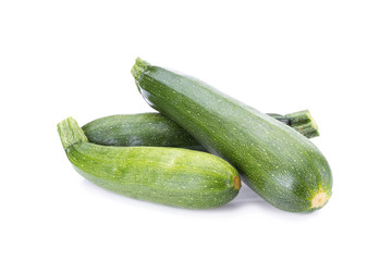 green zucchini vegetables isolated on white