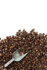 Coffee beans and spoon isolated on white background

