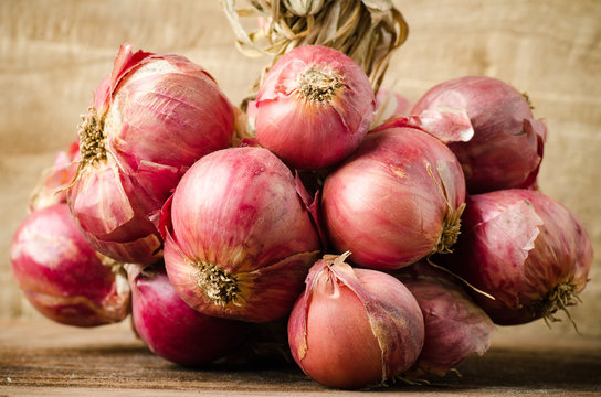 Fresh shallot on wooden background