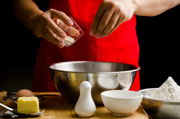 Preparation bread cooking,pouring the yeast in the bowl