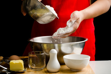 Preparation bread cooking,pouring the flour in the bowl