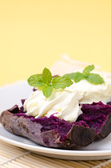 Purple sweet potatoes with whipping cream on top