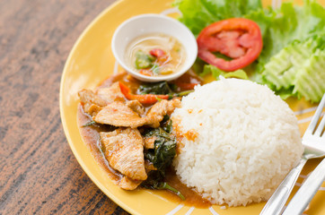 Thai food,spicy fried pork with pepper and jasmine rice