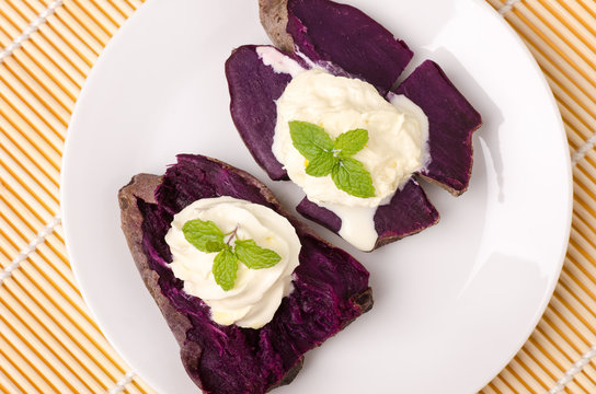 Purple sweet potatoes with whipping cream on top