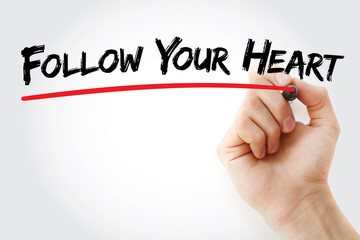 Hand writing Follow Your Heart with marker, concept background