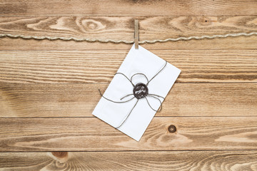 Mail envelope on rope