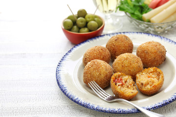 arancini di riso, fried risotto rice balls, italian sicilian food