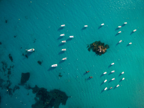 Aerial view of boats in a splendid cove in Corsica