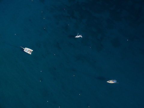 Aerial view of boats in a splendid cove in Corsica