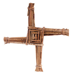 Saint Brigid's cross made from  straw isolated on white. 1 February is St. Brigid's feast day.  Brigid's Cross blessed the house and  protected it from fire and evil - obrazy, fototapety, plakaty