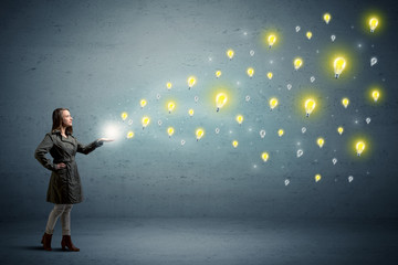 Woman holding lightbulbs