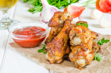 Spicy chicken wings with ketchup