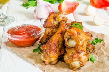 Spicy chicken wings with ketchup