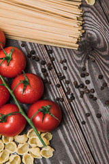 Fresh Italian food on wooden background.