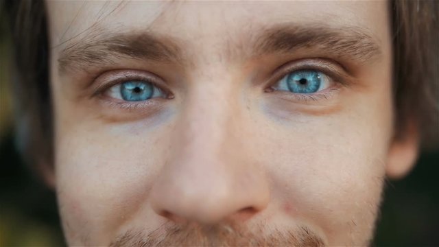 Highly Detailed Close-Up Portrait of Handsome Man With Beautiful Blue Eyes, Outdoor