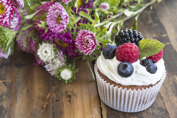 Delicious Cupcake with Fruits and Flowers