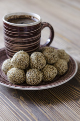Truffles of chickpeas with chocolate and sesame seeds   