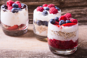yogurt with oatmeal , blueberries , raspberries and strawberries