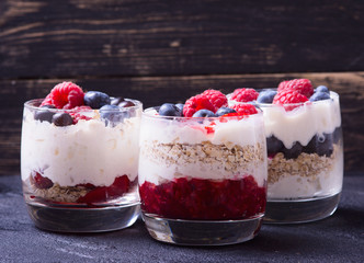 yogurt with oatmeal , blueberries , raspberries and strawberries