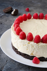 Cheesecake with Oreo cookies and raspberries