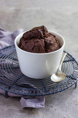 chocolate muffin in white ramekin