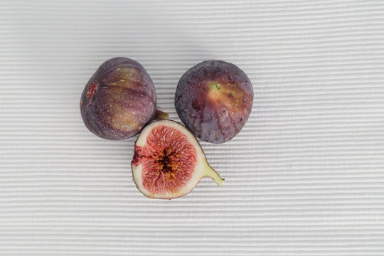 Common figs on a white background, painterly