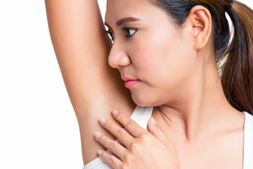 woman holding her arms up and showing underarms