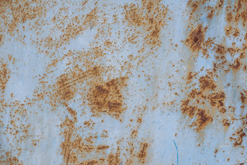 surface of rusty iron with remnants of old paint, grunge metal surface, great background or texture...