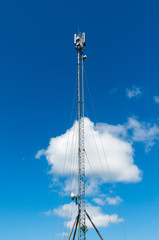 Telecommunication tower with antennas.