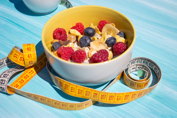 Diet breakfast-cereals with raspberries and blueberries