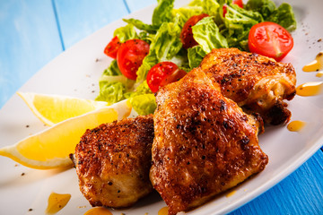 Grilled chicken thighs and vegetables 