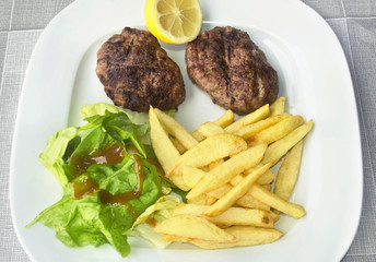 grilled burger with potato fries - greek food