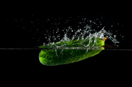 Cucumber splashing water