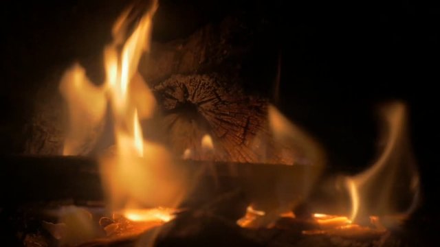 Fireplace at home warm close-up 1080p HD slow motion video - Tree logs on fire burning close up slow-mo 1920X1080 footage 