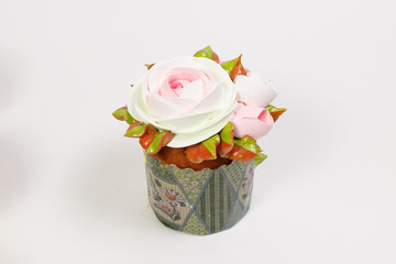 small cake with cream flowers