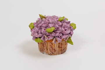 small cake with cream flowers