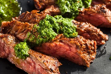 Papier Peint photo autocollant Steakhouse Homemade Cooked Skirt Steak with Chimichurri