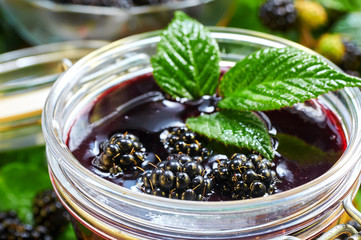 Jar with home made wild blackberry jam