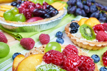 Mix of fruit tarts and fresh fruits