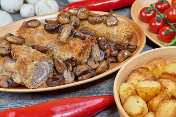 Pork roulades with mushrooms and vegetables