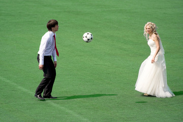 couple plaing football