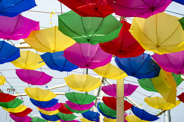 Fototapeta na wymiar Hanging reversed umbrellas