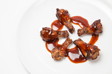 Fried chicken wings with red sauce thai and chinese food mixed style isolated on white background