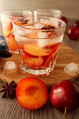slivovitz (plum brandy) with ice and fresh plums 