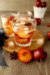 slivovitz (plum brandy) with ice and fresh plums 
