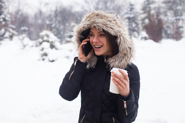 Winter, woman and hot coffee