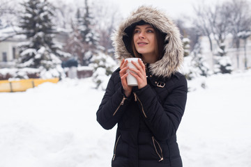 Winter, woman and hot beverage