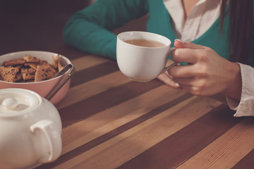 Woman and a cup od coffee