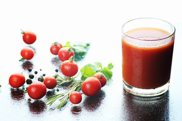 glass of tomato juice drops