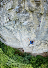 male rock climber. rock climber climbs on a rocky wall.
